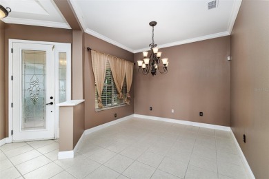 Welcome to this beautiful 3-bedroom, 2-bath lakefront home on Grasslands Golf and Country Club in Florida - for sale on GolfHomes.com, golf home, golf lot