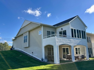 This home overlooks the pristine Lake Michigan Hills Golf Course on Lake Michigan Hills Golf Club in Michigan - for sale on GolfHomes.com, golf home, golf lot