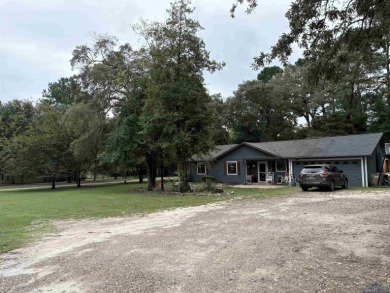 Charming Corner Lot nestled in the serene, gated community of on Holly Lake Ranch Golf Club in Texas - for sale on GolfHomes.com, golf home, golf lot