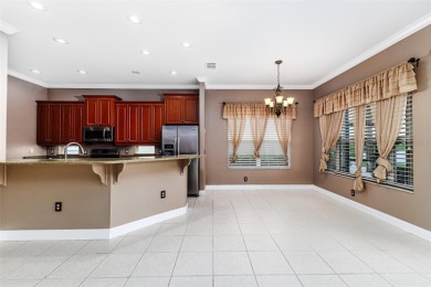 Welcome to this beautiful 3-bedroom, 2-bath lakefront home on Grasslands Golf and Country Club in Florida - for sale on GolfHomes.com, golf home, golf lot