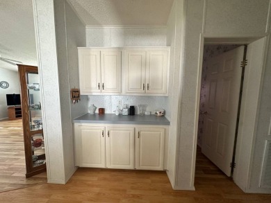 PRICE REDUCED $10,000! Nestled on a quiet lot on La Costa Lane on Four Lakes Golf Club in Florida - for sale on GolfHomes.com, golf home, golf lot