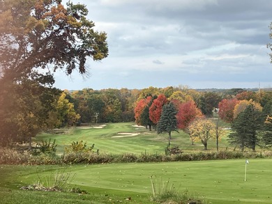 This home overlooks the pristine Lake Michigan Hills Golf Course on Lake Michigan Hills Golf Club in Michigan - for sale on GolfHomes.com, golf home, golf lot