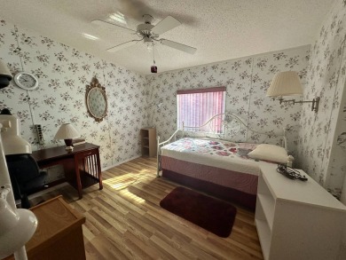 PRICE REDUCED $10,000! Nestled on a quiet lot on La Costa Lane on Four Lakes Golf Club in Florida - for sale on GolfHomes.com, golf home, golf lot