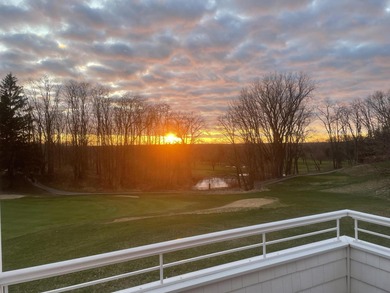 This home overlooks the pristine Lake Michigan Hills Golf Course on Lake Michigan Hills Golf Club in Michigan - for sale on GolfHomes.com, golf home, golf lot