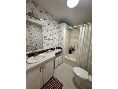 PRICE REDUCED $10,000! Nestled on a quiet lot on La Costa Lane on Four Lakes Golf Club in Florida - for sale on GolfHomes.com, golf home, golf lot