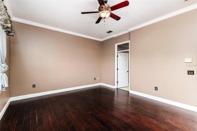 Welcome to this beautiful 3-bedroom, 2-bath lakefront home on Grasslands Golf and Country Club in Florida - for sale on GolfHomes.com, golf home, golf lot