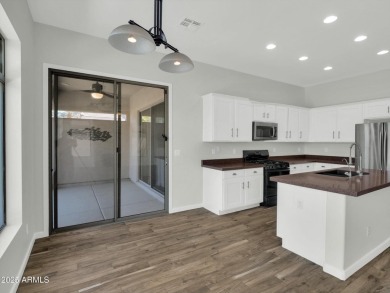 Enjoy your resort style backyard with its private heated pool on Raven Golf Club At South Mountain in Arizona - for sale on GolfHomes.com, golf home, golf lot