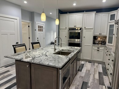 This home overlooks the pristine Lake Michigan Hills Golf Course on Lake Michigan Hills Golf Club in Michigan - for sale on GolfHomes.com, golf home, golf lot