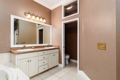 Welcome to this beautiful 3-bedroom, 2-bath lakefront home on Grasslands Golf and Country Club in Florida - for sale on GolfHomes.com, golf home, golf lot