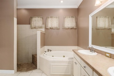 Welcome to this beautiful 3-bedroom, 2-bath lakefront home on Grasslands Golf and Country Club in Florida - for sale on GolfHomes.com, golf home, golf lot