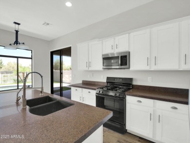 Enjoy your resort style backyard with its private heated pool on Raven Golf Club At South Mountain in Arizona - for sale on GolfHomes.com, golf home, golf lot