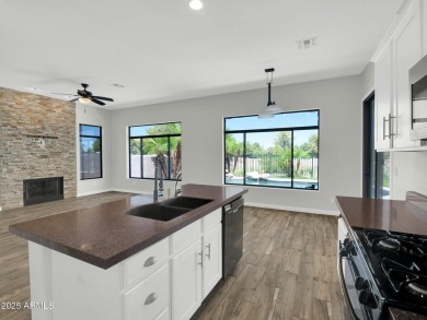 Enjoy your resort style backyard with its private heated pool on Raven Golf Club At South Mountain in Arizona - for sale on GolfHomes.com, golf home, golf lot