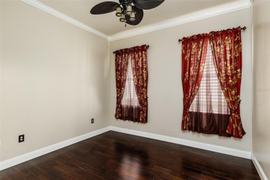 Welcome to this beautiful 3-bedroom, 2-bath lakefront home on Grasslands Golf and Country Club in Florida - for sale on GolfHomes.com, golf home, golf lot