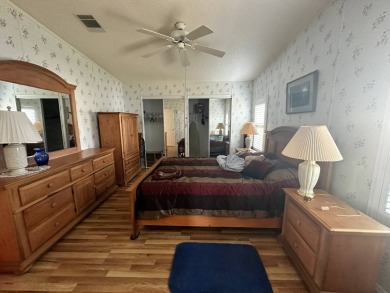 PRICE REDUCED $10,000! Nestled on a quiet lot on La Costa Lane on Four Lakes Golf Club in Florida - for sale on GolfHomes.com, golf home, golf lot
