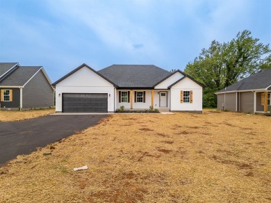 This brand-new construction offers a relaxed and stylish on Russellville Country Club in Kentucky - for sale on GolfHomes.com, golf home, golf lot