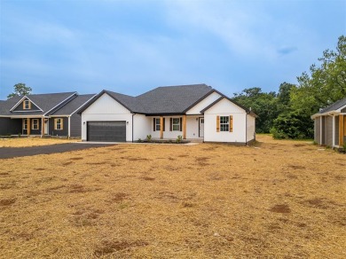 This brand-new construction offers a relaxed and stylish on Russellville Country Club in Kentucky - for sale on GolfHomes.com, golf home, golf lot