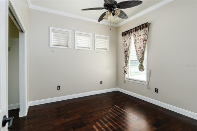 Welcome to this beautiful 3-bedroom, 2-bath lakefront home on Grasslands Golf and Country Club in Florida - for sale on GolfHomes.com, golf home, golf lot