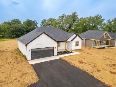 This brand-new construction offers a relaxed and stylish on Russellville Country Club in Kentucky - for sale on GolfHomes.com, golf home, golf lot