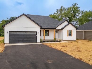 This brand-new construction offers a relaxed and stylish on Russellville Country Club in Kentucky - for sale on GolfHomes.com, golf home, golf lot