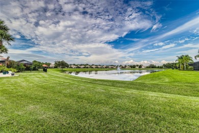Welcome to this beautiful 3-bedroom, 2-bath lakefront home on Grasslands Golf and Country Club in Florida - for sale on GolfHomes.com, golf home, golf lot
