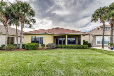 Welcome to this beautiful 3-bedroom, 2-bath lakefront home on Grasslands Golf and Country Club in Florida - for sale on GolfHomes.com, golf home, golf lot
