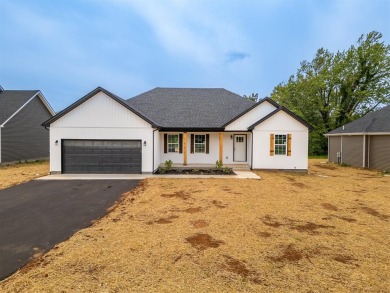 This brand-new construction offers a relaxed and stylish on Russellville Country Club in Kentucky - for sale on GolfHomes.com, golf home, golf lot