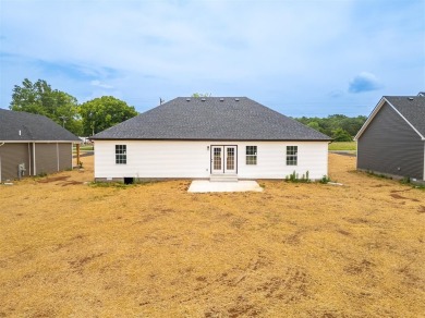 This brand-new construction offers a relaxed and stylish on Russellville Country Club in Kentucky - for sale on GolfHomes.com, golf home, golf lot