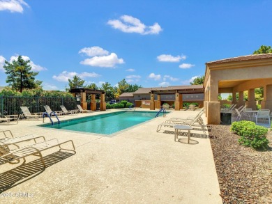 Enjoy your resort style backyard with its private heated pool on Raven Golf Club At South Mountain in Arizona - for sale on GolfHomes.com, golf home, golf lot