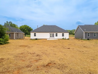 This brand-new construction offers a relaxed and stylish on Russellville Country Club in Kentucky - for sale on GolfHomes.com, golf home, golf lot