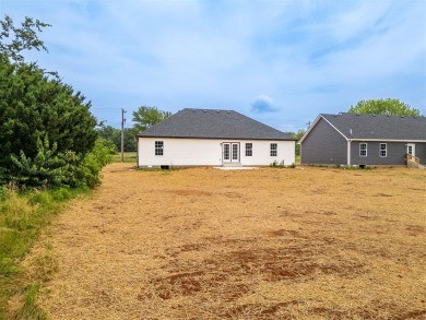 This brand-new construction offers a relaxed and stylish on Russellville Country Club in Kentucky - for sale on GolfHomes.com, golf home, golf lot