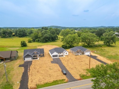 This brand-new construction offers a relaxed and stylish on Russellville Country Club in Kentucky - for sale on GolfHomes.com, golf home, golf lot