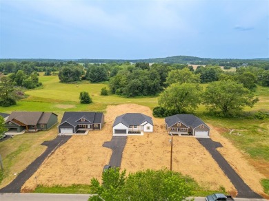 This brand-new construction offers a relaxed and stylish on Russellville Country Club in Kentucky - for sale on GolfHomes.com, golf home, golf lot