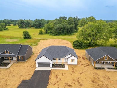 This brand-new construction offers a relaxed and stylish on Russellville Country Club in Kentucky - for sale on GolfHomes.com, golf home, golf lot