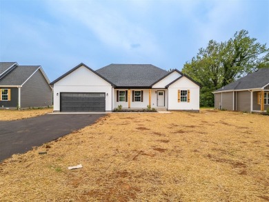 This brand-new construction offers a relaxed and stylish on Russellville Country Club in Kentucky - for sale on GolfHomes.com, golf home, golf lot