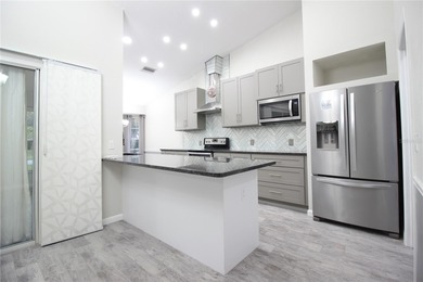 Discover this stunning, completely remodeled gem, located within on Timber Pines Golf Course in Florida - for sale on GolfHomes.com, golf home, golf lot