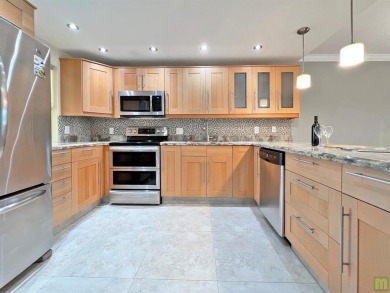 Beautifully updated sixth floor corner unit condo in Palm Aire's on Palm-Aire Country Club and Resort - The Oaks in Florida - for sale on GolfHomes.com, golf home, golf lot