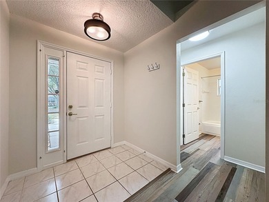 BEAUTIFULLY REMODELED .. MUST SEE!!  Welcome to the highly on Kings Ridge Golf Club in Florida - for sale on GolfHomes.com, golf home, golf lot