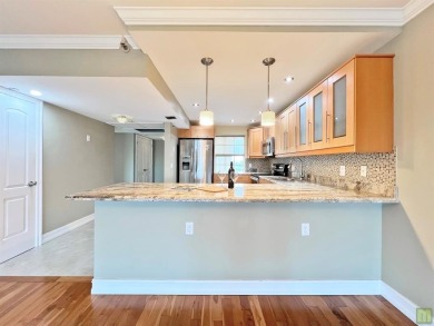 Beautifully updated sixth floor corner unit condo in Palm Aire's on Palm-Aire Country Club and Resort - The Oaks in Florida - for sale on GolfHomes.com, golf home, golf lot