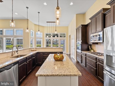 This coastal-style contemporary home is perfectly positioned on on The Peninsula Golf and Country Club in Delaware - for sale on GolfHomes.com, golf home, golf lot