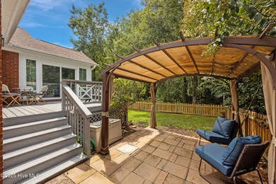 Beautifully maintained brick home on a private corner lot in the on Taberna Country Club in North Carolina - for sale on GolfHomes.com, golf home, golf lot