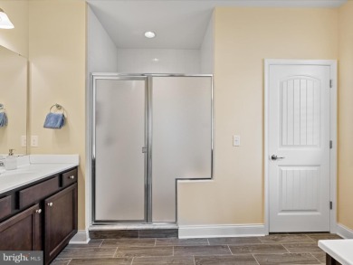 This coastal-style contemporary home is perfectly positioned on on The Peninsula Golf and Country Club in Delaware - for sale on GolfHomes.com, golf home, golf lot