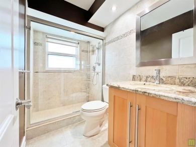 Beautifully updated sixth floor corner unit condo in Palm Aire's on Palm-Aire Country Club and Resort - The Oaks in Florida - for sale on GolfHomes.com, golf home, golf lot