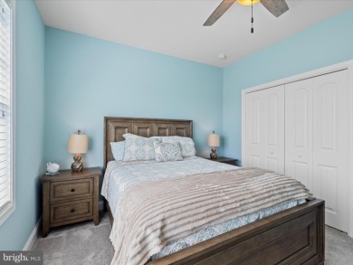 This coastal-style contemporary home is perfectly positioned on on The Peninsula Golf and Country Club in Delaware - for sale on GolfHomes.com, golf home, golf lot