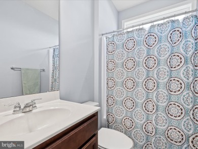 This coastal-style contemporary home is perfectly positioned on on The Peninsula Golf and Country Club in Delaware - for sale on GolfHomes.com, golf home, golf lot