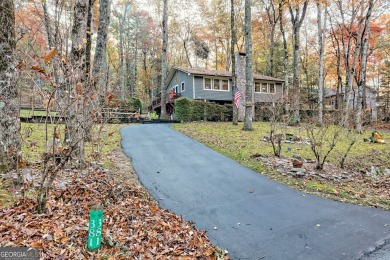 Located in the heart of Sky Valley, welcome to 381 W Sugarbush on Sky Valley Resort and Country Club in Georgia - for sale on GolfHomes.com, golf home, golf lot