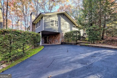 Located in the heart of Sky Valley, welcome to 381 W Sugarbush on Sky Valley Resort and Country Club in Georgia - for sale on GolfHomes.com, golf home, golf lot