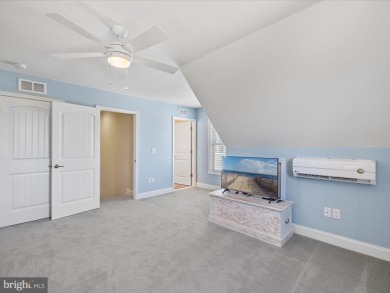 This coastal-style contemporary home is perfectly positioned on on The Peninsula Golf and Country Club in Delaware - for sale on GolfHomes.com, golf home, golf lot