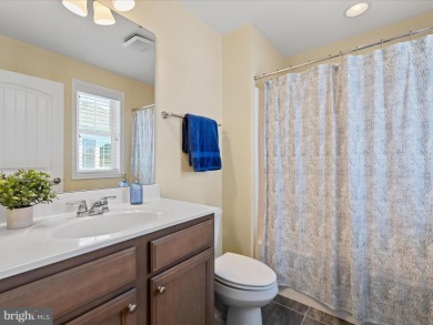This coastal-style contemporary home is perfectly positioned on on The Peninsula Golf and Country Club in Delaware - for sale on GolfHomes.com, golf home, golf lot