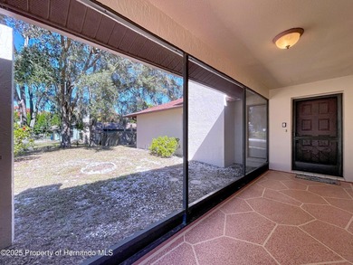 A brand new roof will top this terrific home before closing! on Oak Hills Country Club in Florida - for sale on GolfHomes.com, golf home, golf lot