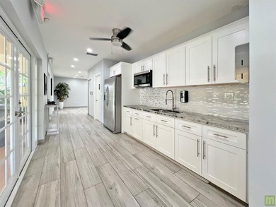 Beautifully updated corner unit condo in Palm Aire's highly on Palm-Aire Country Club and Resort - The Oaks in Florida - for sale on GolfHomes.com, golf home, golf lot